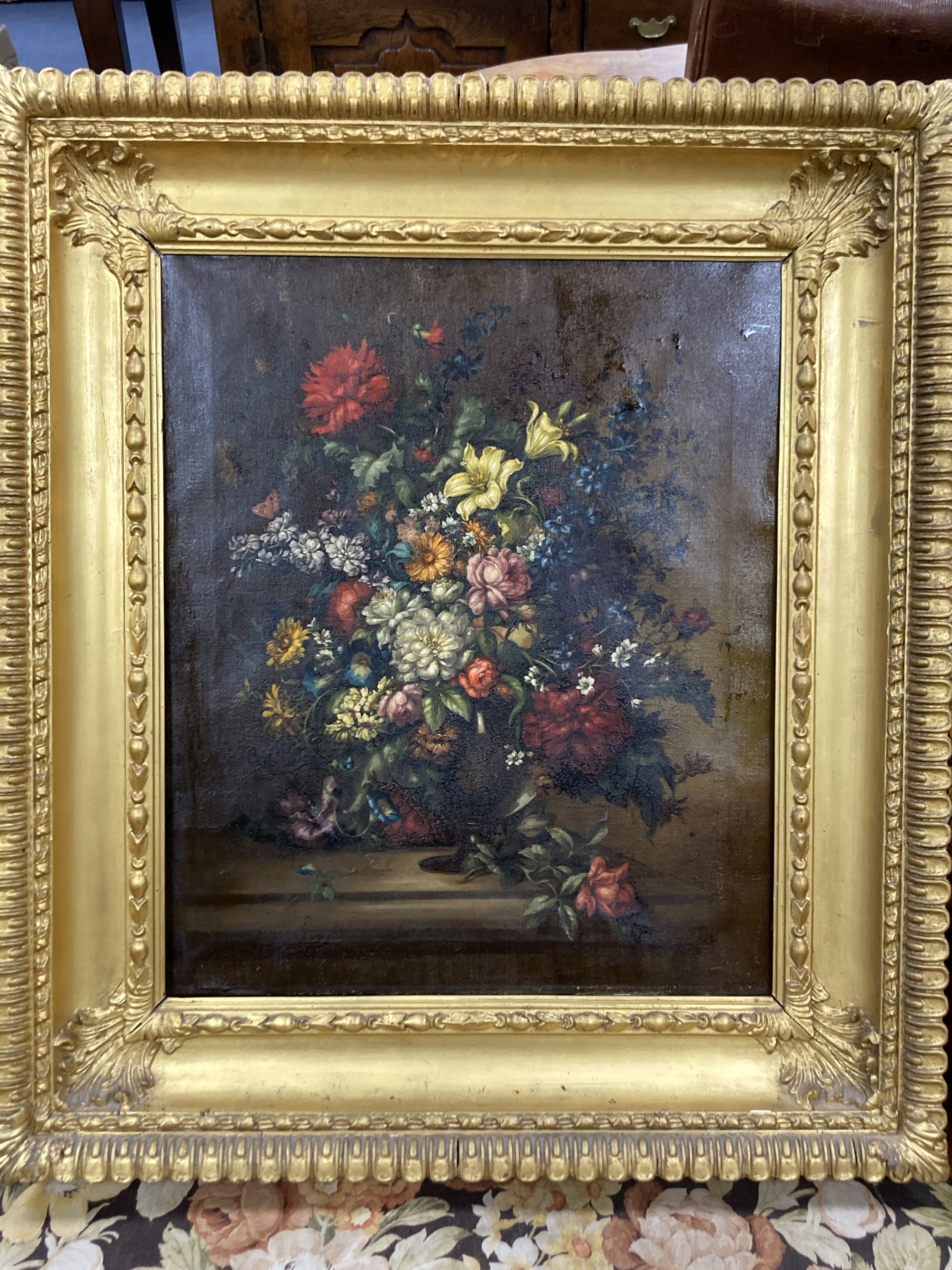 English School c.1900, oil on canvas, Still life of flowers in a vase upon a ledge, 60 x 50cm